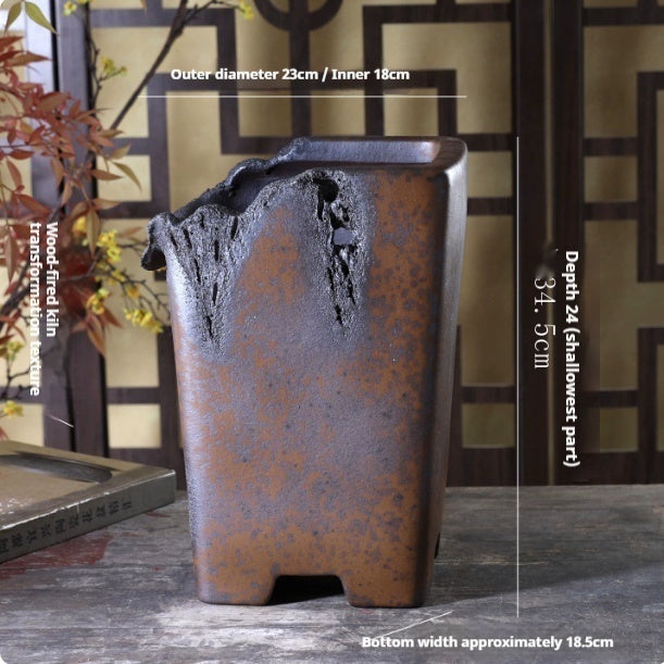 Tall irregular-rim pot with dimension annotations