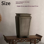 Tall charcoal square pot on carved stand with measurement labels