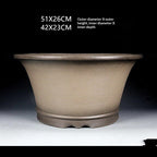Front view of the deep round taupe pot with dimension annotations
