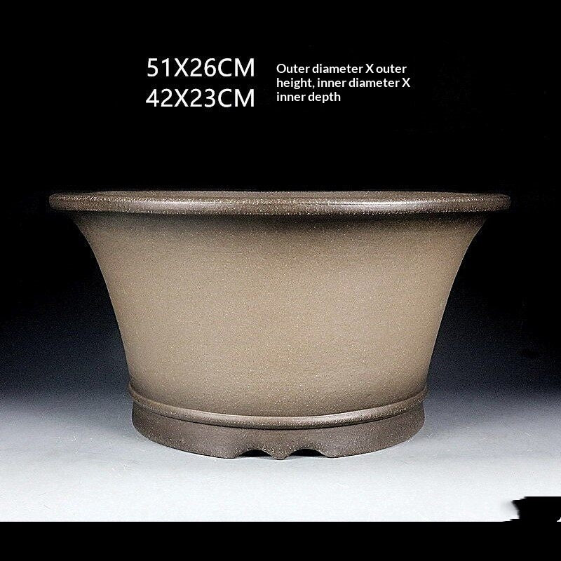 Front view of the deep round taupe pot with dimension annotations