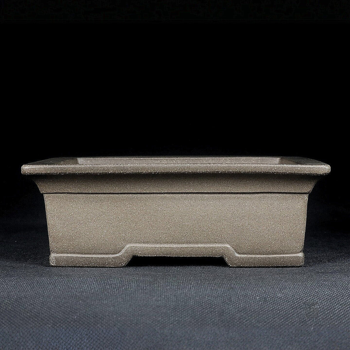 Gray rectangular bonsai pot with broad rim and notched base