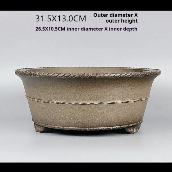 Side profile of taupe round bonsai pot with measurement labels
