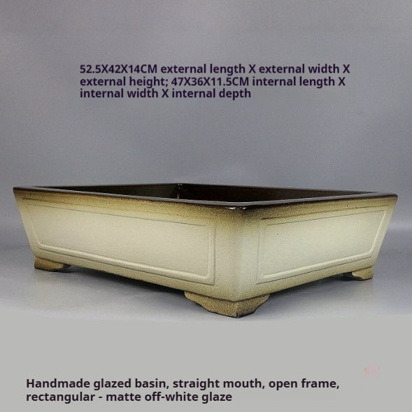 Angled ivory-glazed pot with exterior and interior size annotations