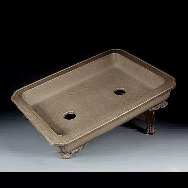 Interior of taupe rectangular pot showing two large openings and smaller holes