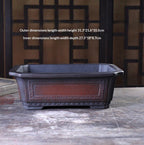 Dimension photograph of the dark rectangular pot with patterned side border