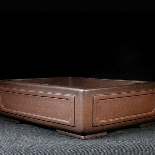 Brown rectangular pot with recessed framed panels