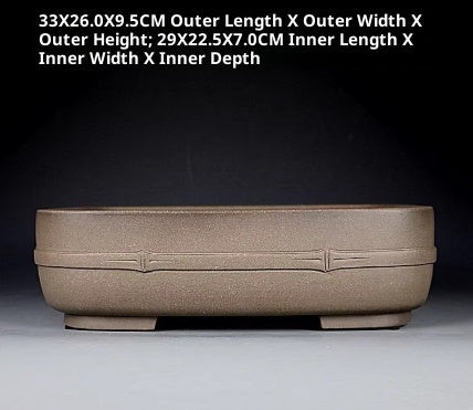 Taupe rectangular bonsai pot with rounded corners, a horizontal band and low feet, with measurements above
