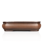 Shallow Yixing purple clay bonsai pot, front view on white background