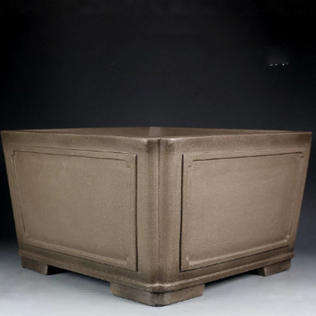 Deep taupe square bonsai pot with framed panels and block feet
