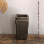 Tall dark square pot with open rim and sunlight color annotation