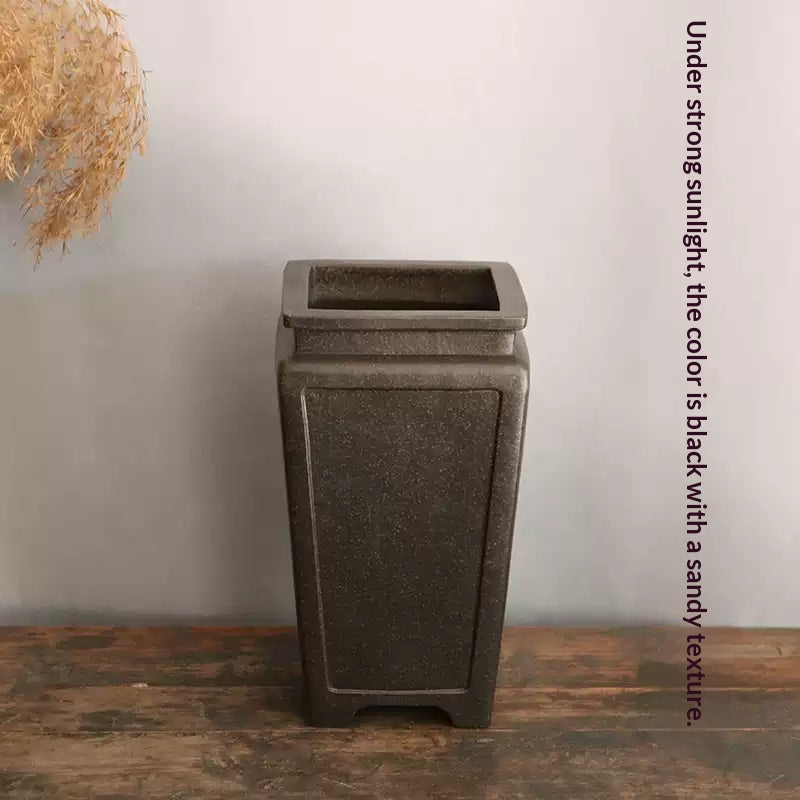 Tall dark square pot with open rim and sunlight color annotation