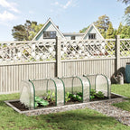 Low tunnel greenhouse on a garden bed