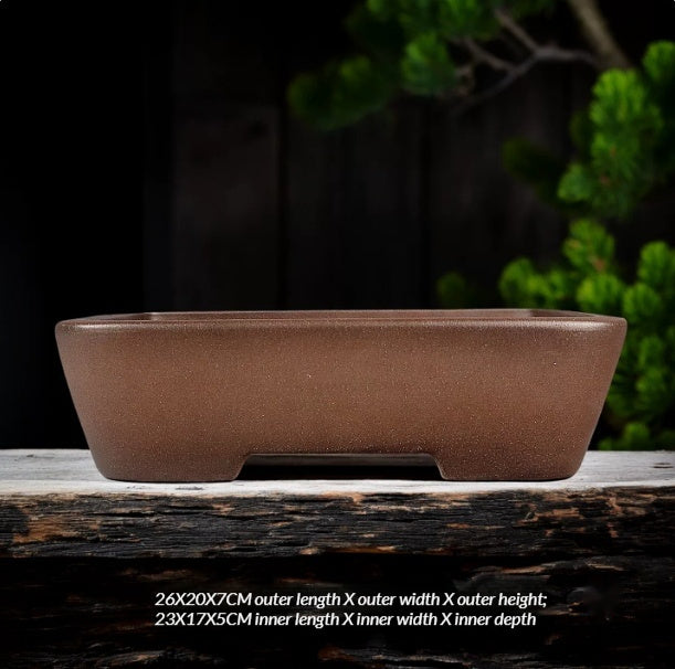 Plain brown rectangular pot with low cutout feet and size labels