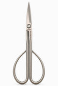 Silver bonsai pruning scissors with long narrow blades and large loop handles