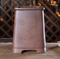 Tall brown square bonsai pot with faint landscape decoration
