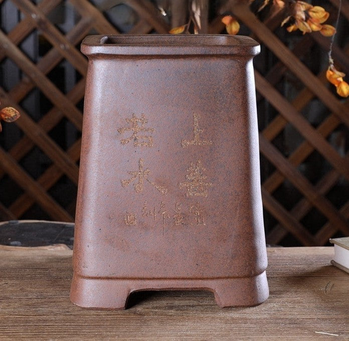 Tall brown square bonsai pot with faint landscape decoration