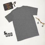 Plain back of heathered dark gray Bonsai Life Co. T-shirt in a white Halloween flat lay
