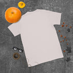 Plain back of pale gray Bonsai Life Co. T-shirt in a gray flat lay with pumpkins