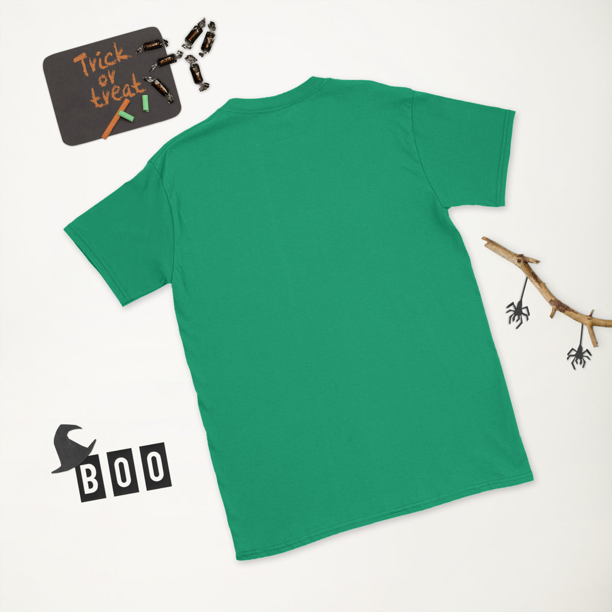 Plain back of bright green Bonsai Life Co. T-shirt in a white Halloween flat lay