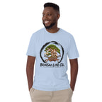 Model wearing light blue T-shirt with green bonsai and pirate skull graphic inside a black circle with Bonsai Life Co. lettering, front view