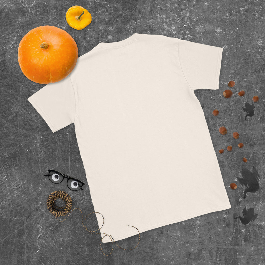 Plain back of cream Bonsai Life Co. T-shirt in a gray flat lay with pumpkins