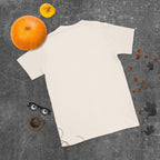 Plain back of cream Bonsai Life Co. T-shirt in a gray flat lay with pumpkins