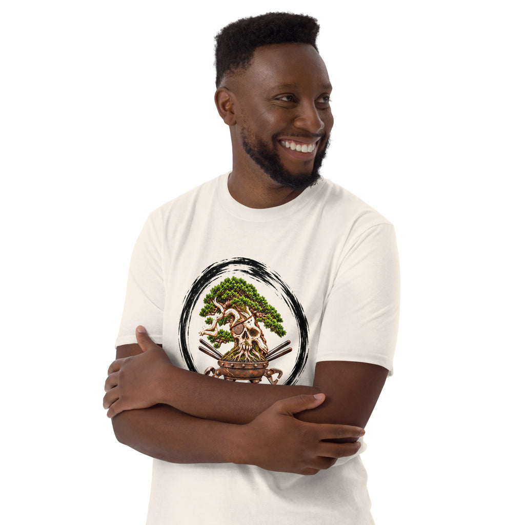 Model wearing cream T-shirt with green bonsai and pirate skull graphic inside a black circle with Bonsai Life Co. lettering, arms-crossed close view