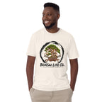 Model wearing cream T-shirt with green bonsai and pirate skull graphic inside a black circle with Bonsai Life Co. lettering, front view