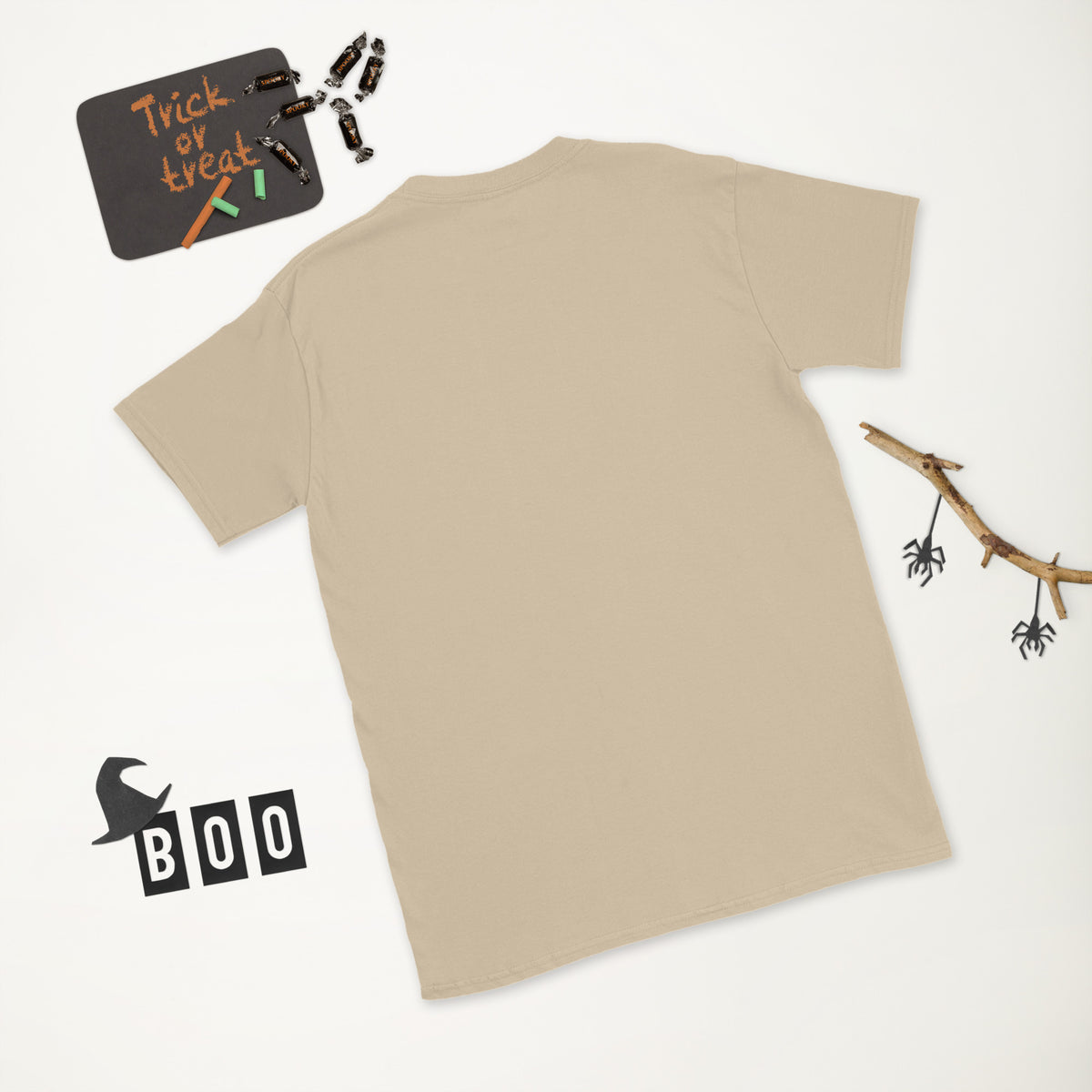 Plain back of sand beige Bonsai Life Co. T-shirt in a white Halloween flat lay