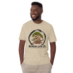 Model wearing sand beige T-shirt with green bonsai and pirate skull graphic inside a black circle with Bonsai Life Co. lettering, front view