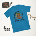 sapphire blue T-shirt with green bonsai and pirate skull graphic inside a black circle with Bonsai Life Co. lettering, white Halloween flat lay