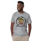 Model wearing heathered light gray T-shirt with green bonsai and pirate skull graphic inside a black circle with Bonsai Life Co. lettering, front view