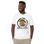 Model wearing white T-shirt with green bonsai and pirate skull graphic inside a black circle with Bonsai Life Co. lettering, front view