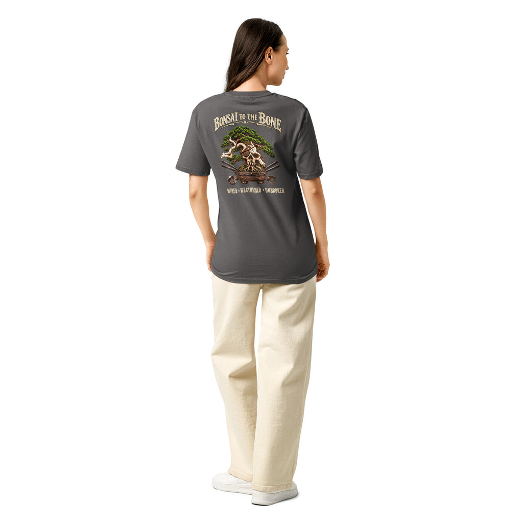 Model showing back of charcoal gray T-shirt with green bonsai and pirate skull graphic with "Bonsai to the Bone" lettering