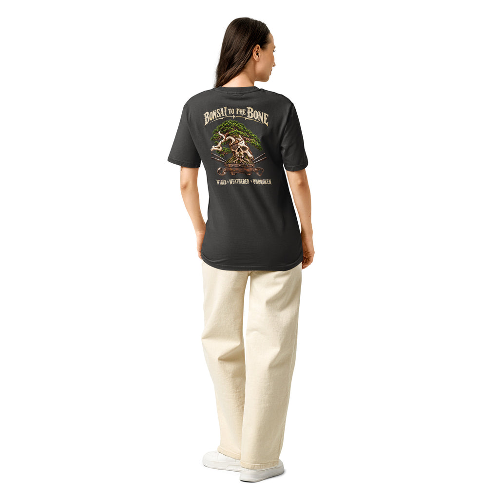 Model showing back of washed black T-shirt with green bonsai and pirate skull graphic with "Bonsai to the Bone" lettering