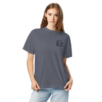 Model wearing slate blue T-shirt with small circular Three Trees chest logo, closer front view