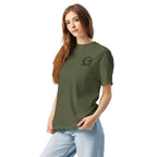 Model wearing olive green T-shirt with small circular Three Trees chest logo, angled front view