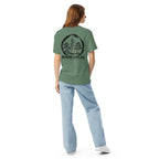 Model showing back of sage green T-shirt with large black Three Trees circle and Bonsai Life Co. lettering