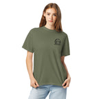 Model wearing moss green T-shirt with small circular Three Trees chest logo, closer front view