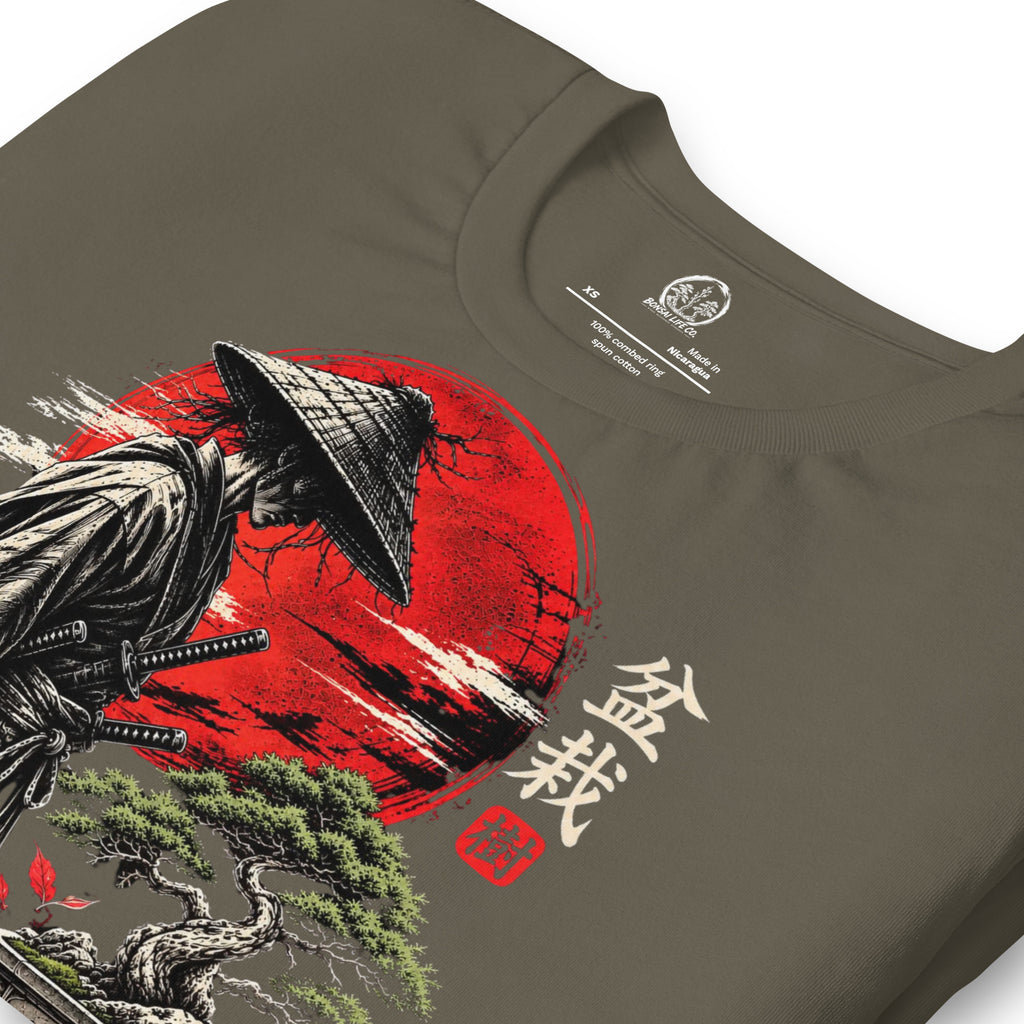 Close-up of samurai beside a green bonsai and red sun with Bonsai Life Co. lettering on gray-green T-shirt