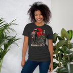 Model wearing dark gray T-shirt with samurai beside a green bonsai and red sun with Bonsai Life Co. lettering, beside leafy plants