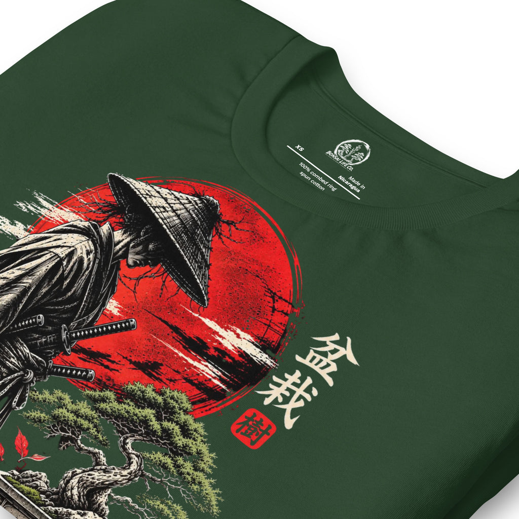 Close-up of samurai beside a green bonsai and red sun with Bonsai Life Co. lettering on forest green T-shirt