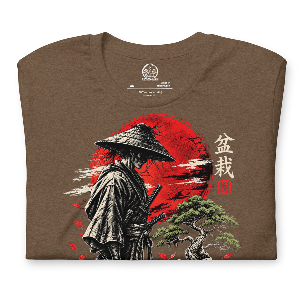 Folded heathered brown T-shirt showing samurai beside a green bonsai and red sun with Bonsai Life Co. lettering