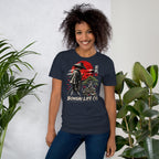 Model wearing heathered navy blue T-shirt with samurai beside a green bonsai and red sun with Bonsai Life Co. lettering, beside leafy plants