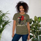 Model wearing heathered olive green T-shirt with samurai beside a green bonsai and red sun with Bonsai Life Co. lettering, beside leafy plants
