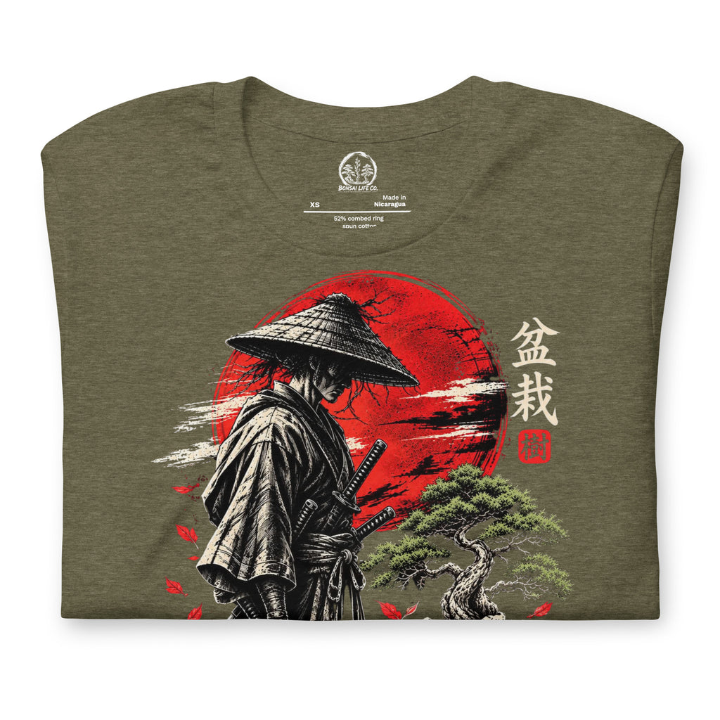 Folded heathered olive green T-shirt showing samurai beside a green bonsai and red sun with Bonsai Life Co. lettering