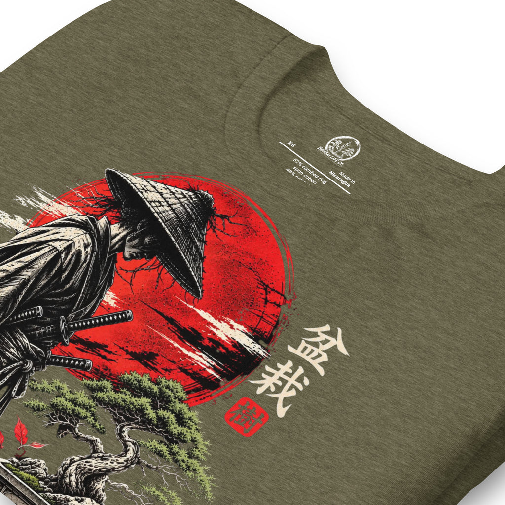 Close-up of samurai beside a green bonsai and red sun with Bonsai Life Co. lettering on heathered olive green T-shirt