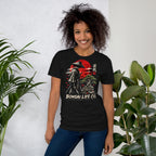 Model wearing vintage black T-shirt with samurai beside a green bonsai and red sun with Bonsai Life Co. lettering, beside leafy plants